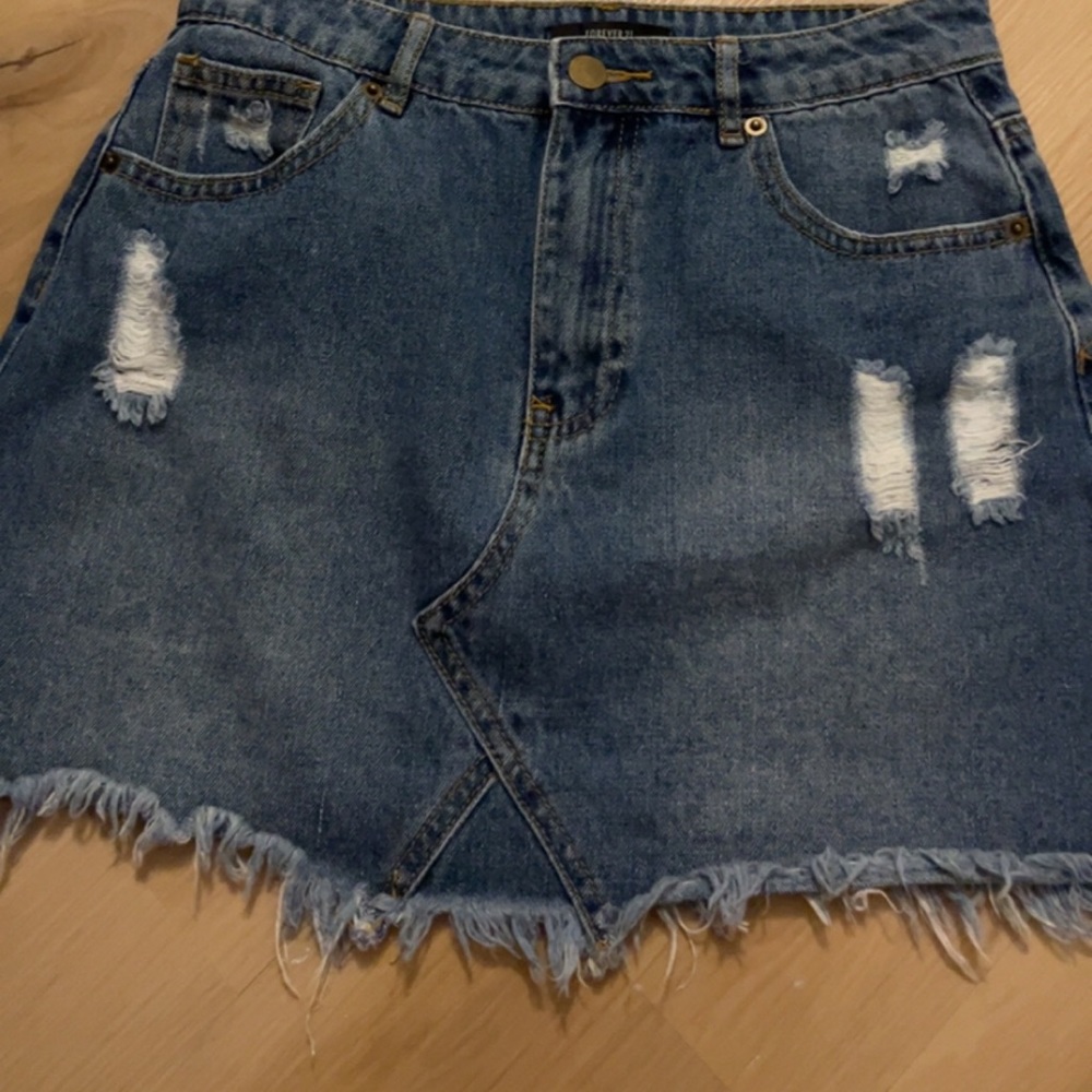Forever 21 ripped jean skirt
